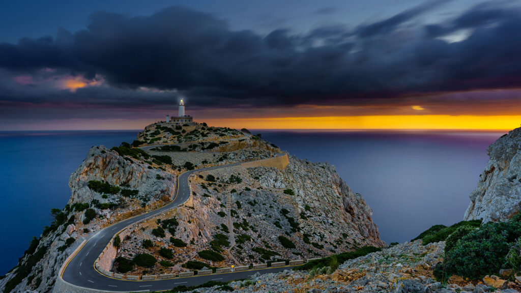 Faro de Formentor: perched on dramatic cliffs, offering breathtaking views of the Mediterranean, a beacon of history and natural beauty in Mallorca.