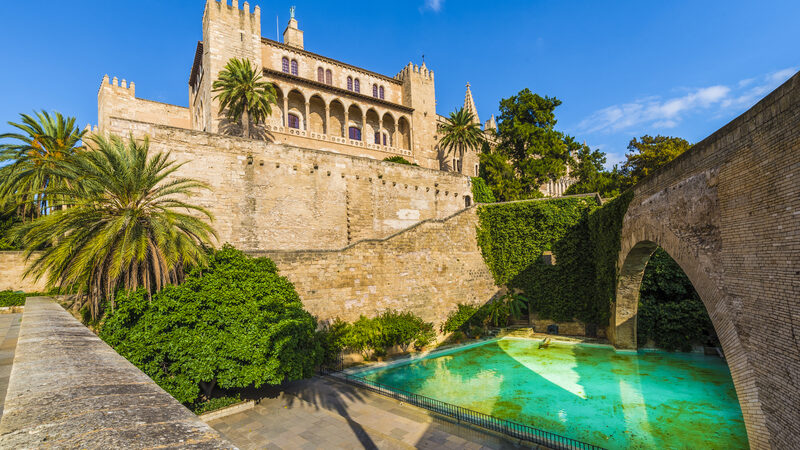 Majestic façade of La Almudaina, the historic royal palace in Palma