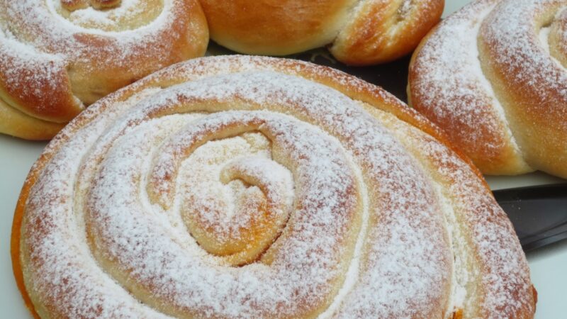 Traditional Mallorcan ensaimada dusted with powdered sugar.