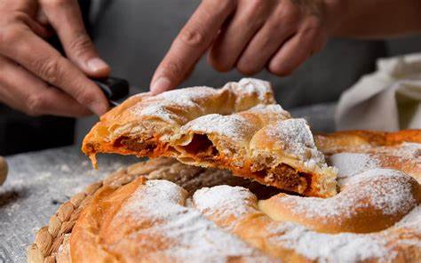 Ensaimada filled with sobrasada, a sausage Mallorcan specialty.