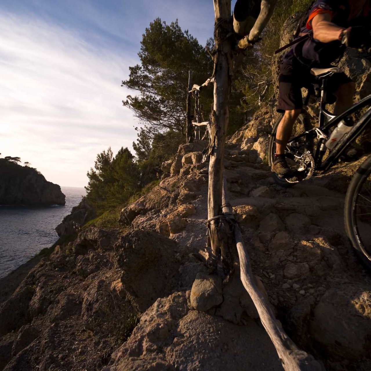 Cyclists enjoying a scenic ride through the Tramuntana mountains in Mallorca