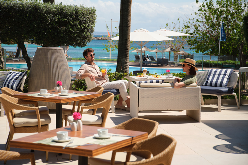 Relaxing by the pool at Son Caliu Spa Oasis in Mallorca.