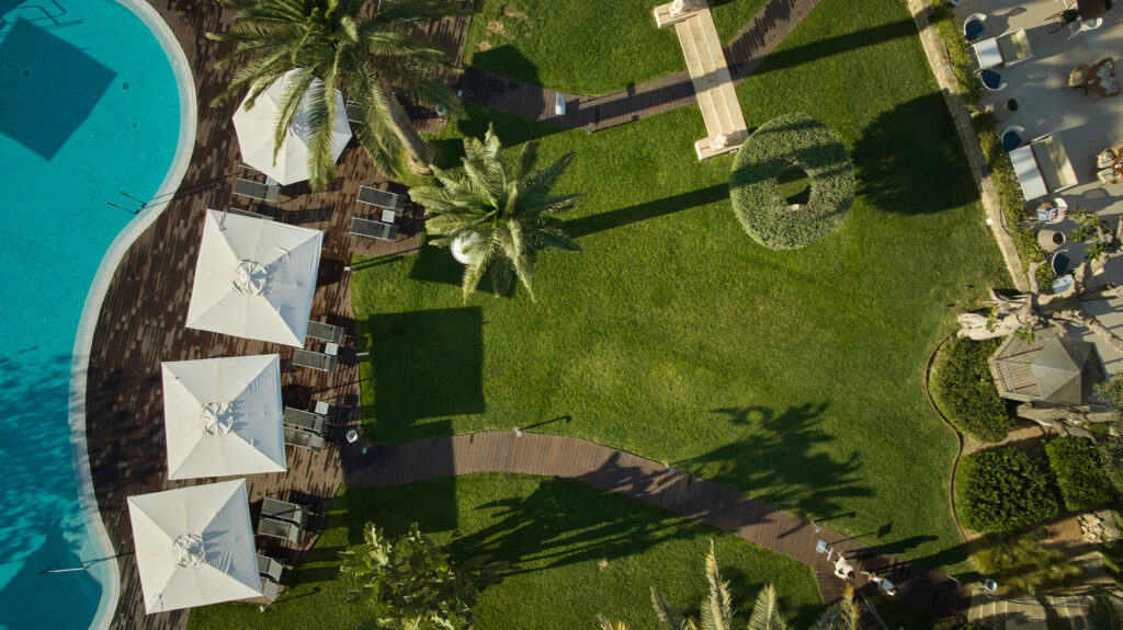 Aerial view of Son Caliu Spa Oasis surrounded by lush gardens.