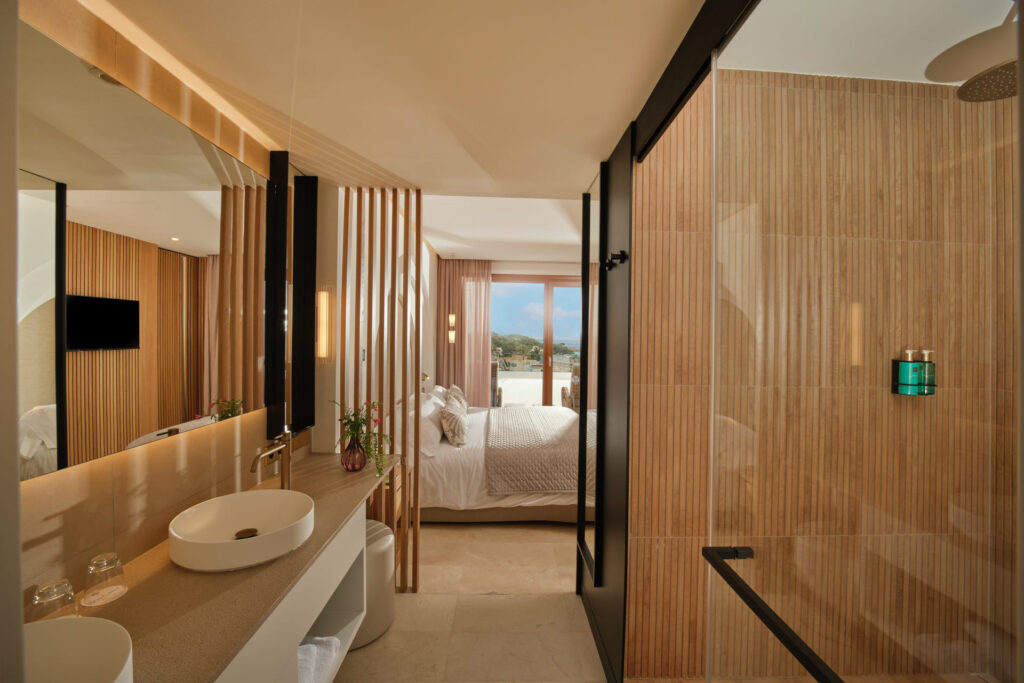 Cozy and stylish hotel room with a private balcony at Son Caliu.