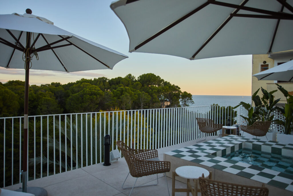 Outdoor pool at Hotel Belle Marivent, with sun loungers, perfect for relaxing.