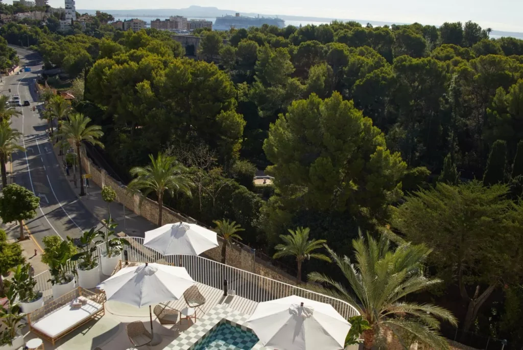 Exterior view of the Hotel Belle Marivent. The modern architecture and sea-view balconies are visible.