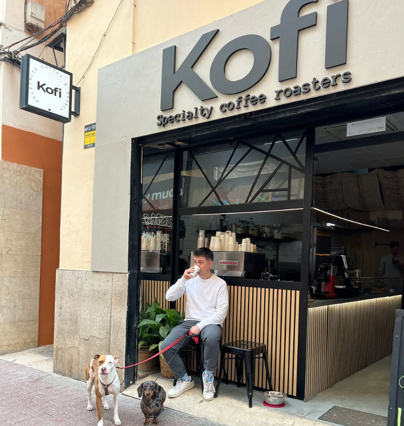 Photograph of the facade of Kofi Coffee Shop in Palma de Mallorca, highlighting its modern and cozy design.