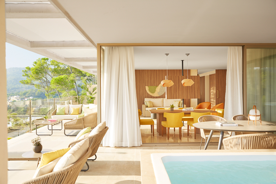 An elegant suite at Zafiro Palace Andratx with a spacious terrace and private jacuzzi.